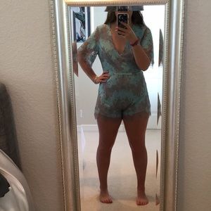 Voge Boutique deep V open back Romper SALE